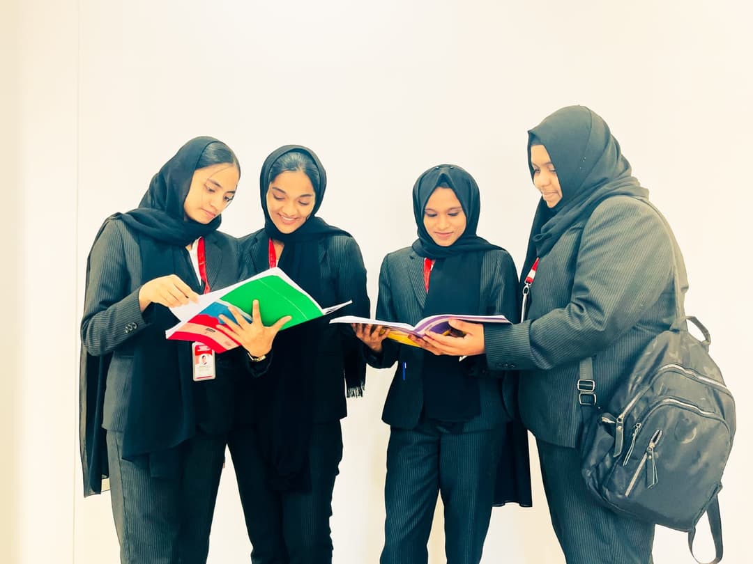 Students working on practical accounting exercises